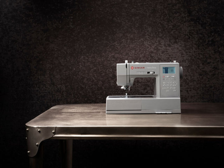 HD6805C-singer-machine-on-steel-table-image