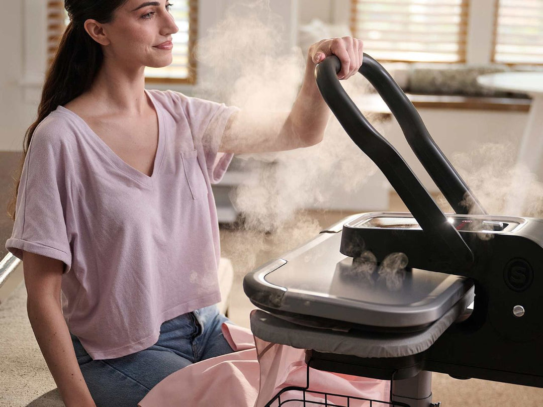 lady-using-the-esp36-steam-press-stand-for-sale